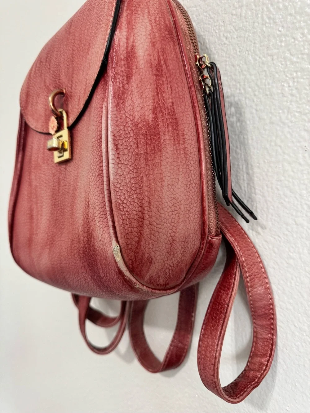 Distressed Circle Backpack With Red Flower lock Accent